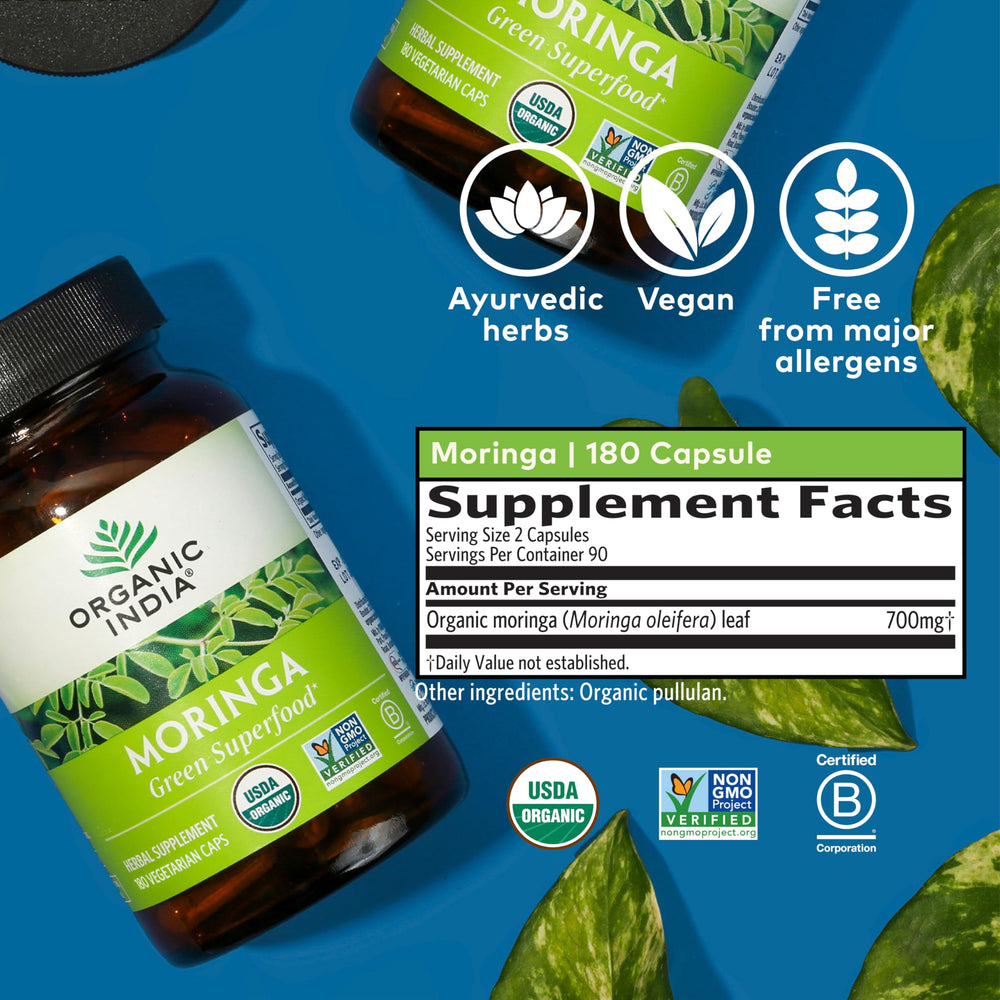 Organic India moringa capsules label, vegan gluten-free wellness capsules.