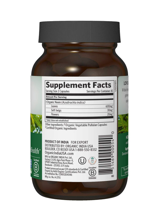 ORGANIC INDIA Neem capsules held in hand for daily wellness