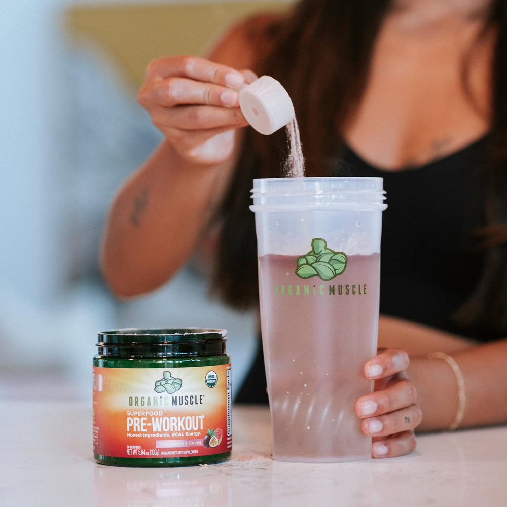 Organic Muscle ingredients list shows plant-based superfoods and clean formula.