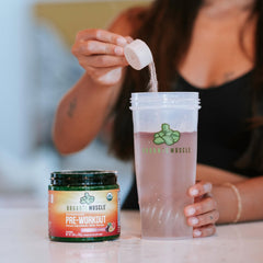 Organic Muscle ingredients list shows plant-based superfoods and clean formula.