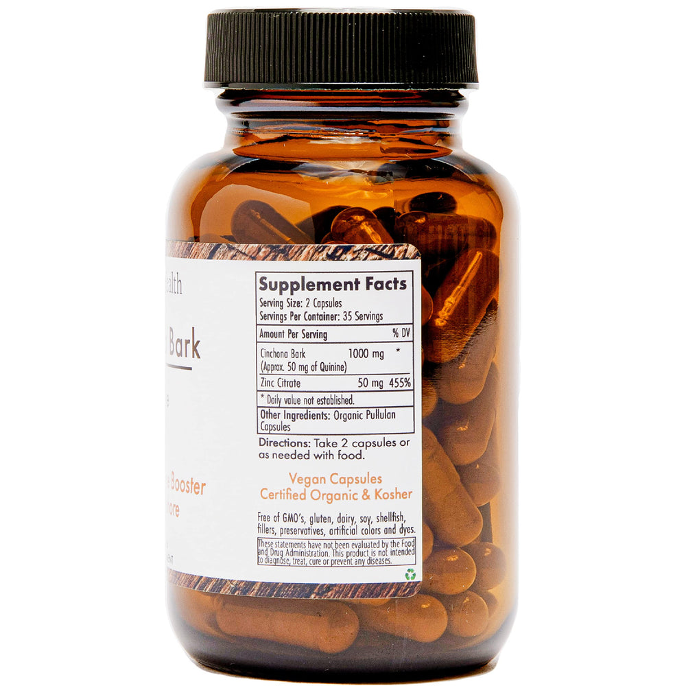 OrganicaHealth Quinine capsules close-up showing pure, non-GMO herbal formula for daily wellness.