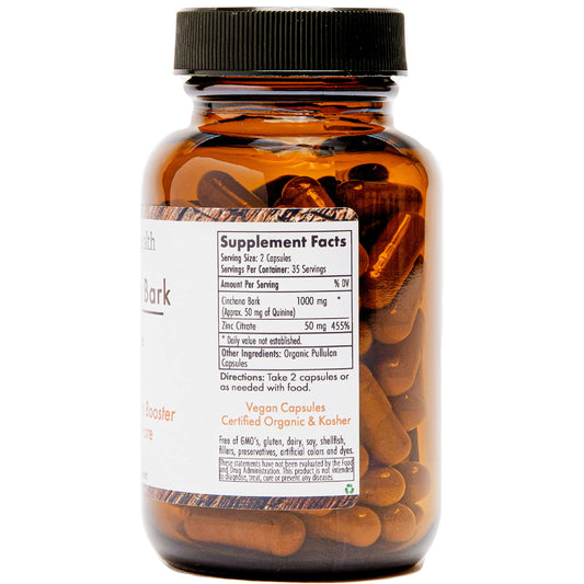 OrganicaHealth Quinine capsules close-up showing pure, non-GMO herbal formula for daily wellness.