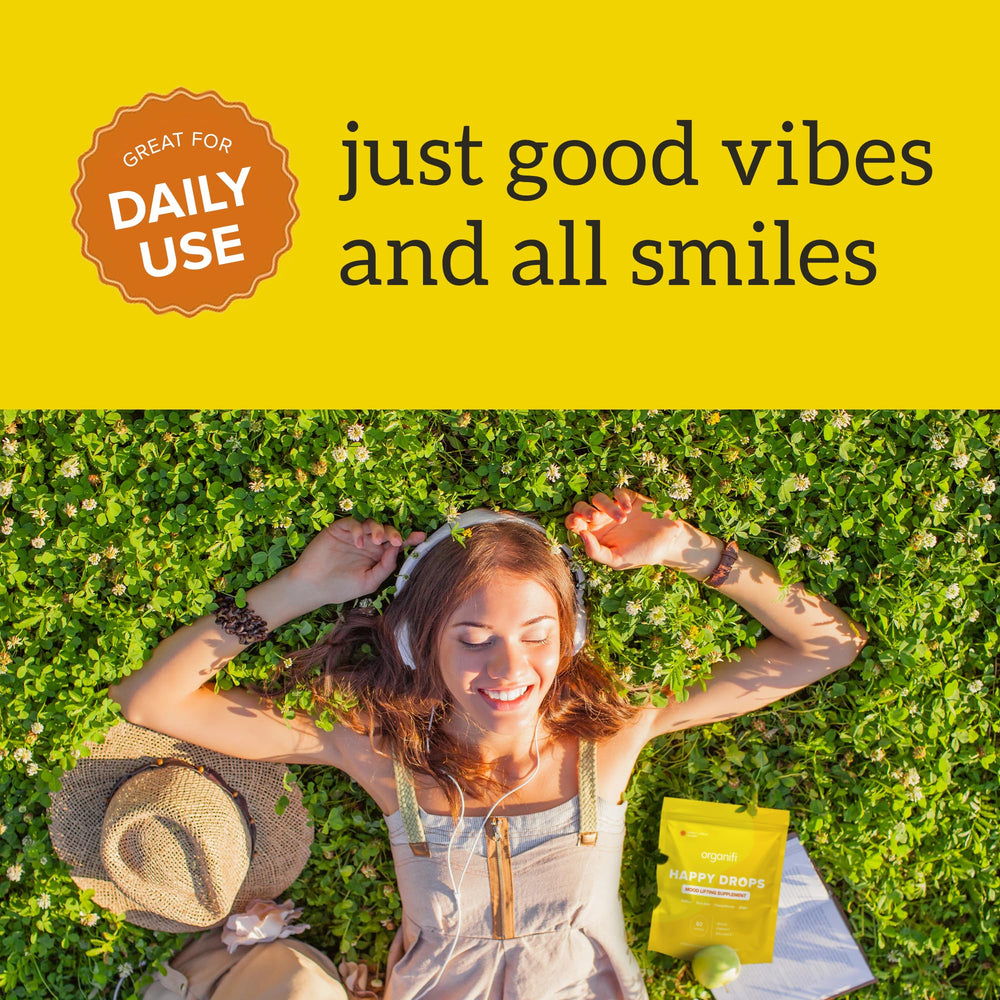 Organifi Happy Drops vegan gluten-free badge indicating plant-based mood support.