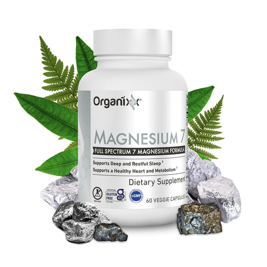 Organixx Magnesium Glycinate bottle on a nightstand for restful sleep.