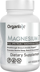 Organixx magnesium calming scene with a glass of water for nighttime routine.