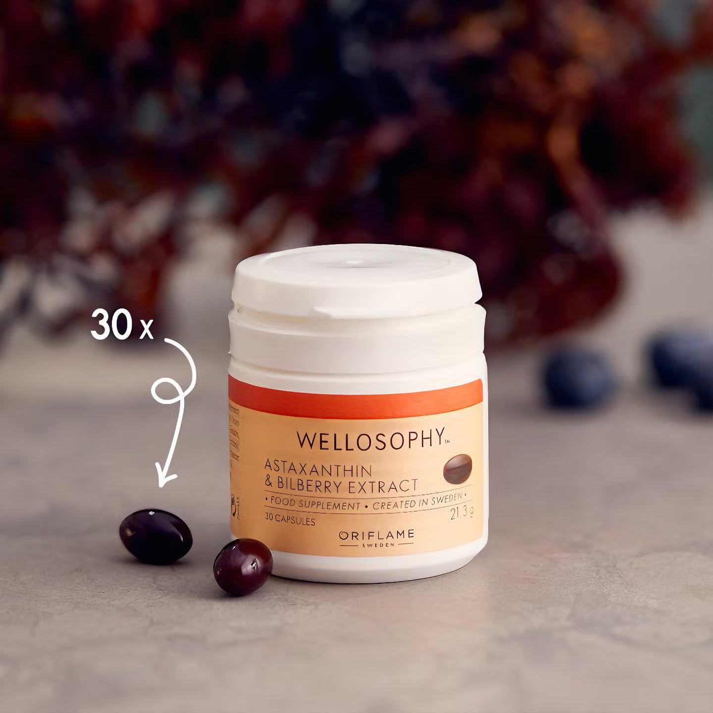 Oriflame Wellness Astaxanthin & Bilberry Extract capsule offering antioxidant skin support.