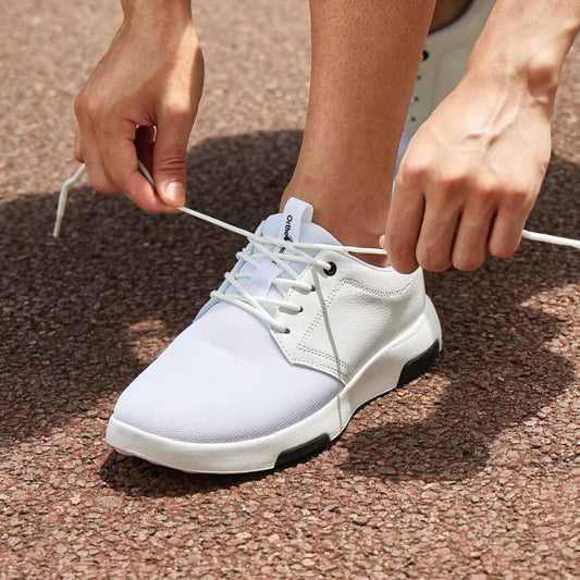 OrthoComfoot sneakers top view highlighting breathable canvas and secure lacing.