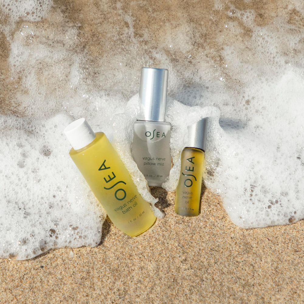 OSEA Vagus Nerve Pillow Mist spray on linens suggesting restful nights and peaceful atmosphere.