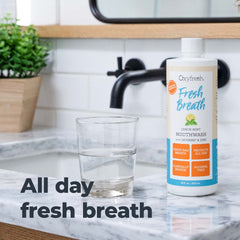 Oxyfresh Lemon Mint bottle with natural xylitol and essential oils icons on label.