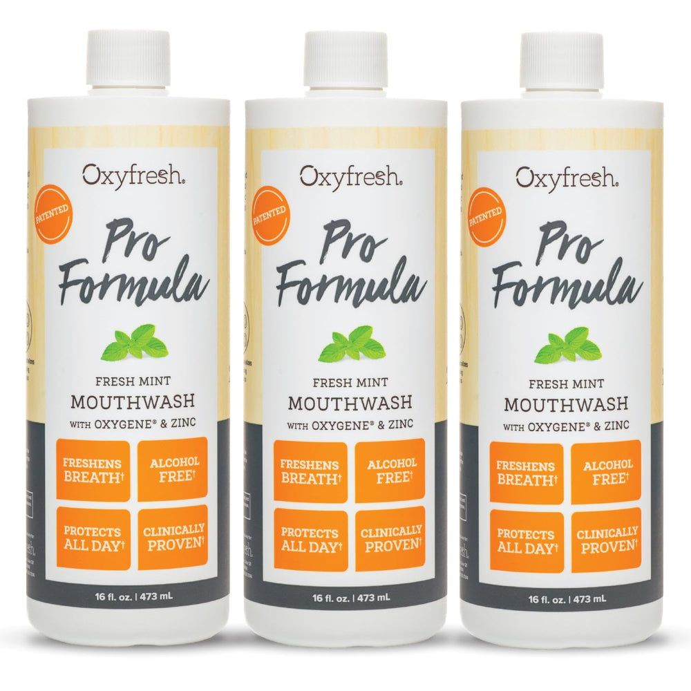 Oxyfresh Pro Formula Fresh Mint Mouthwash bottle, dye-free and alcohol-free for fresh breath.