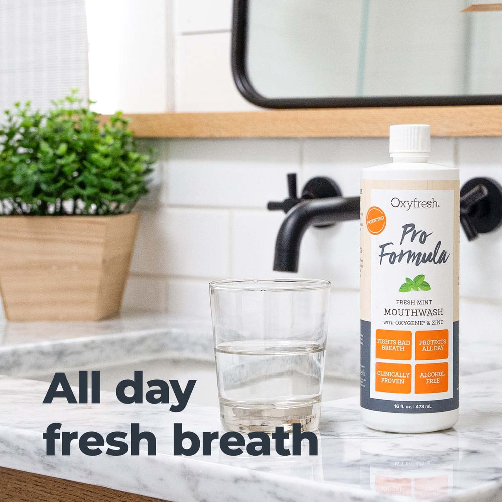 Oxyfresh Pro Formula Fresh Mint Mouthwash measuring cup image.