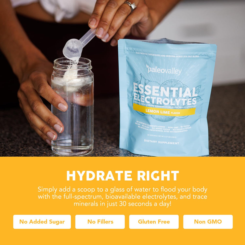 Refreshing lemon-lime Paleovalley Electrolytes being mixed in a glass after a workout