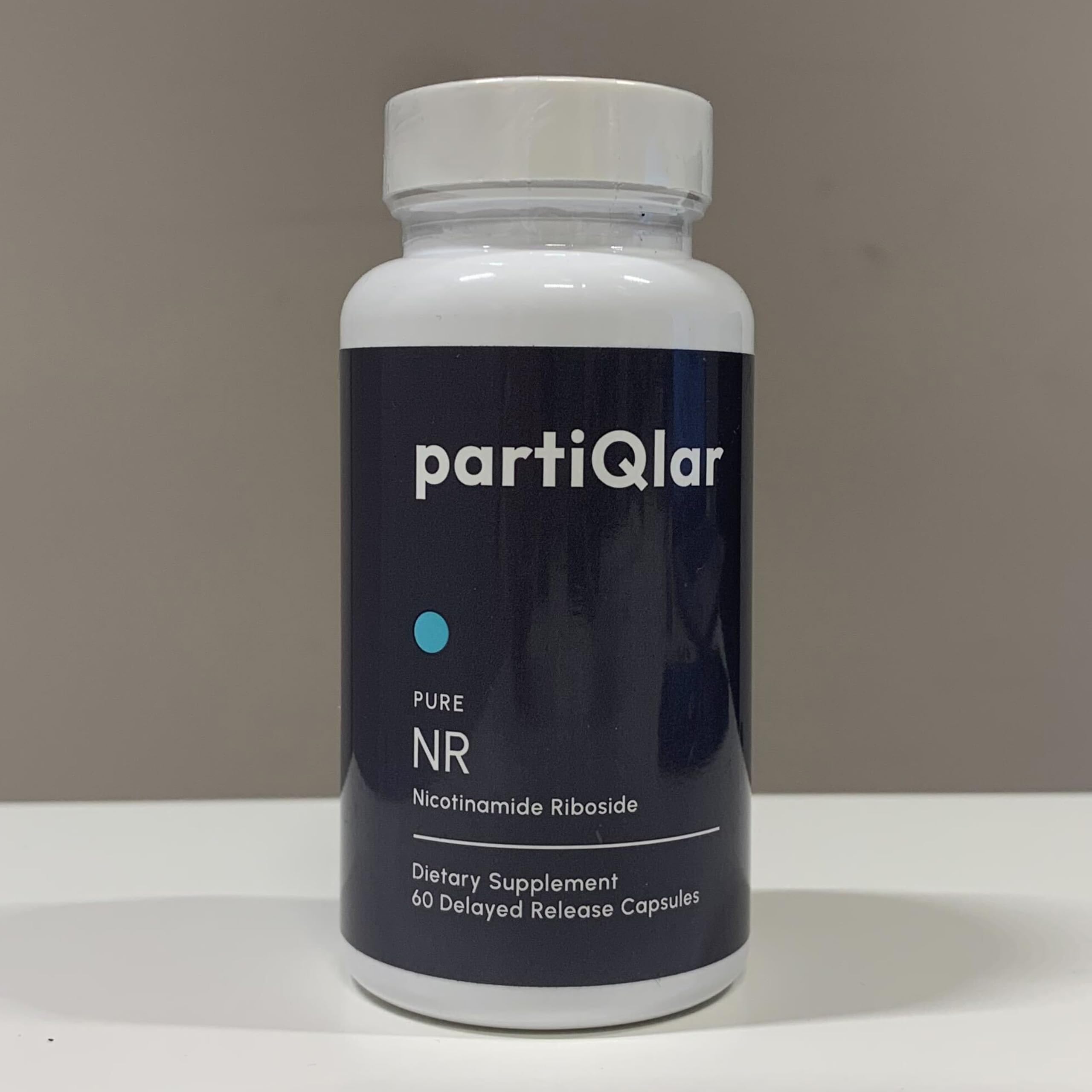 partiQlar NR label detail highlighting dosage and product quality