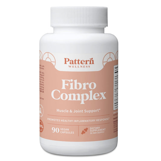 Pattern Wellness Fibro Complex bottle being poured for daily mobility support.