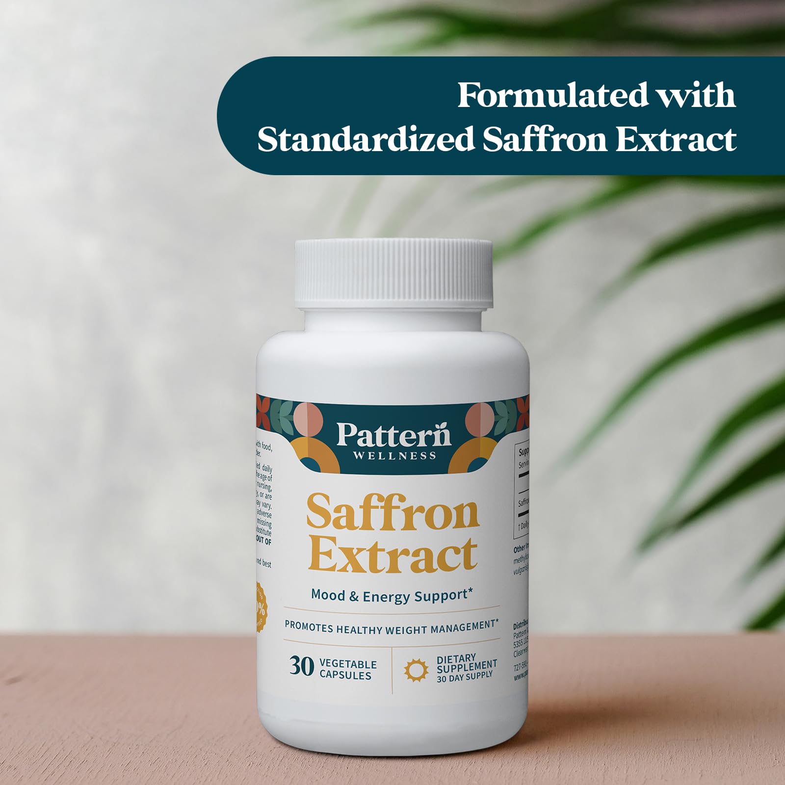 Pattern Wellness saffron extract box placed on a clean kitchen counter.