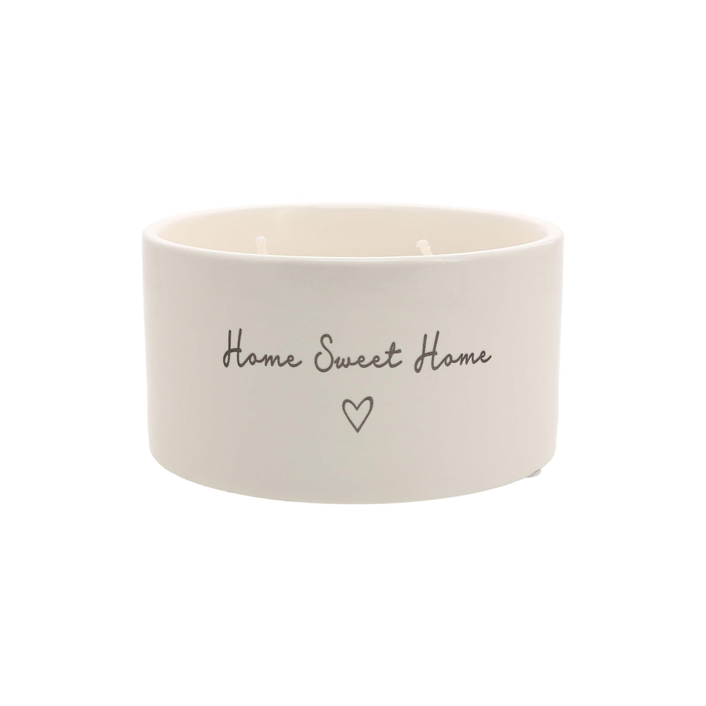 Pavilion Home Sweet Home candle in ceramic vessel with jasmine scent adds elegant ambience.