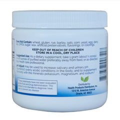 PDI Health PH Adjust dissolving in water — blends smoothly into drinks.