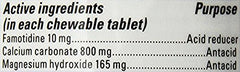 Pepcid Complete Berry chewables on table ready to take
