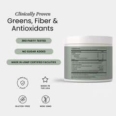 Scooping Perelel Synbiotic Greens into smoothie, easy prep for nutrition on the go.