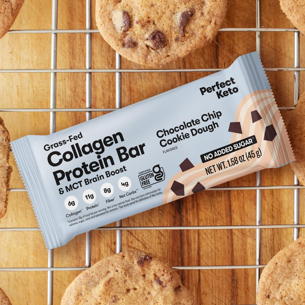 Perfect Keto Collagen Bars held in hand for on-the-go keto snacking.