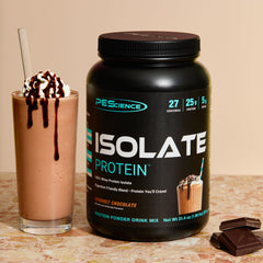 Pouring PEScience Isolate into a shake bottle for convenient mixing