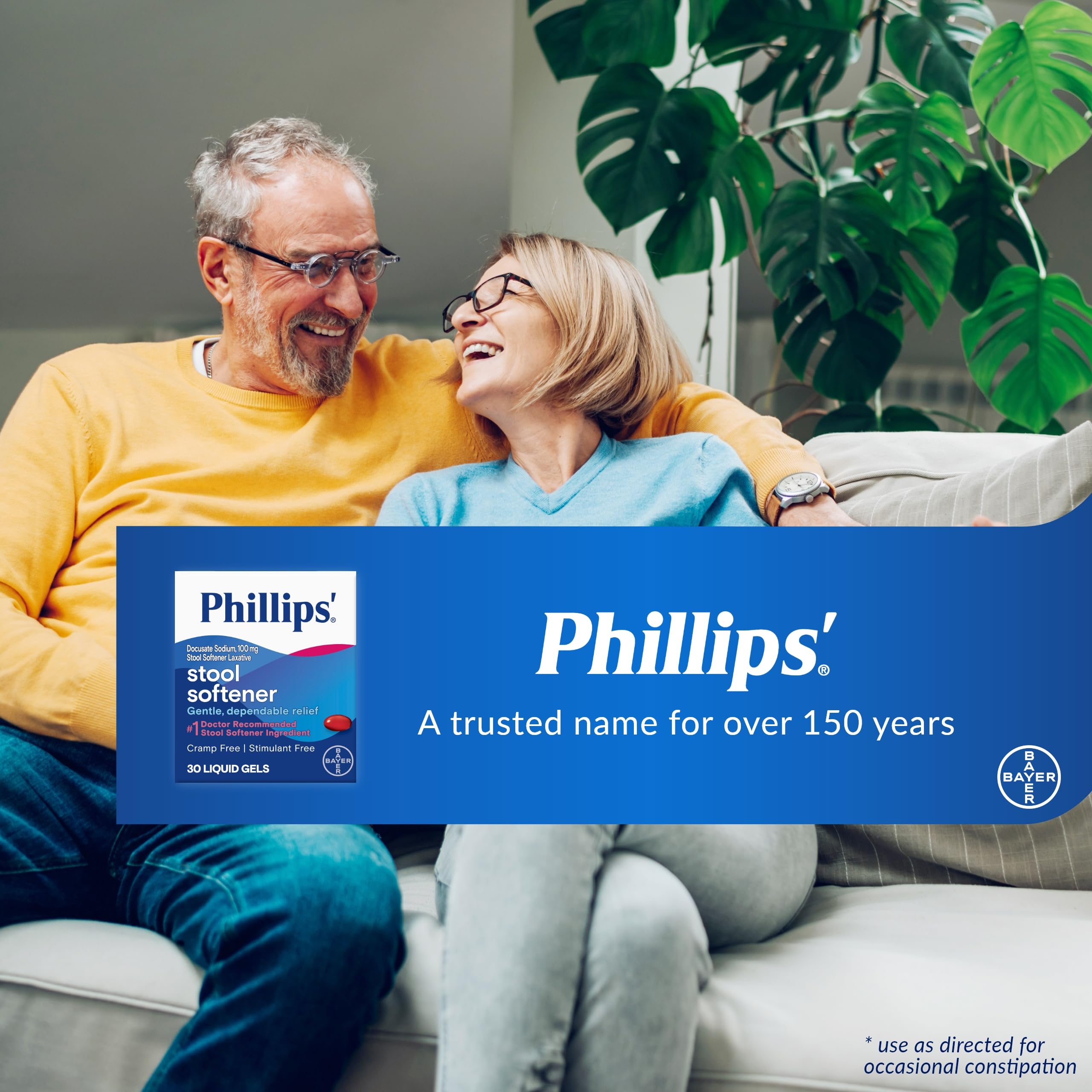 Phillips Stool Softener Liquid Gels with bottle and cup conveys daily ease.