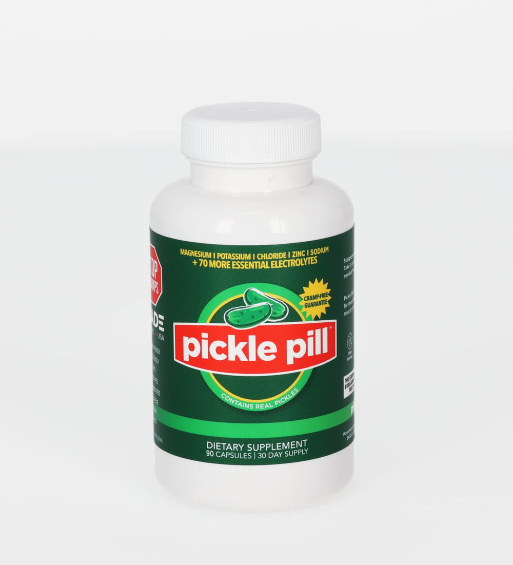 PicklePill Cramp Defense bottle being poured to showcase rapid electrolyte delivery.
