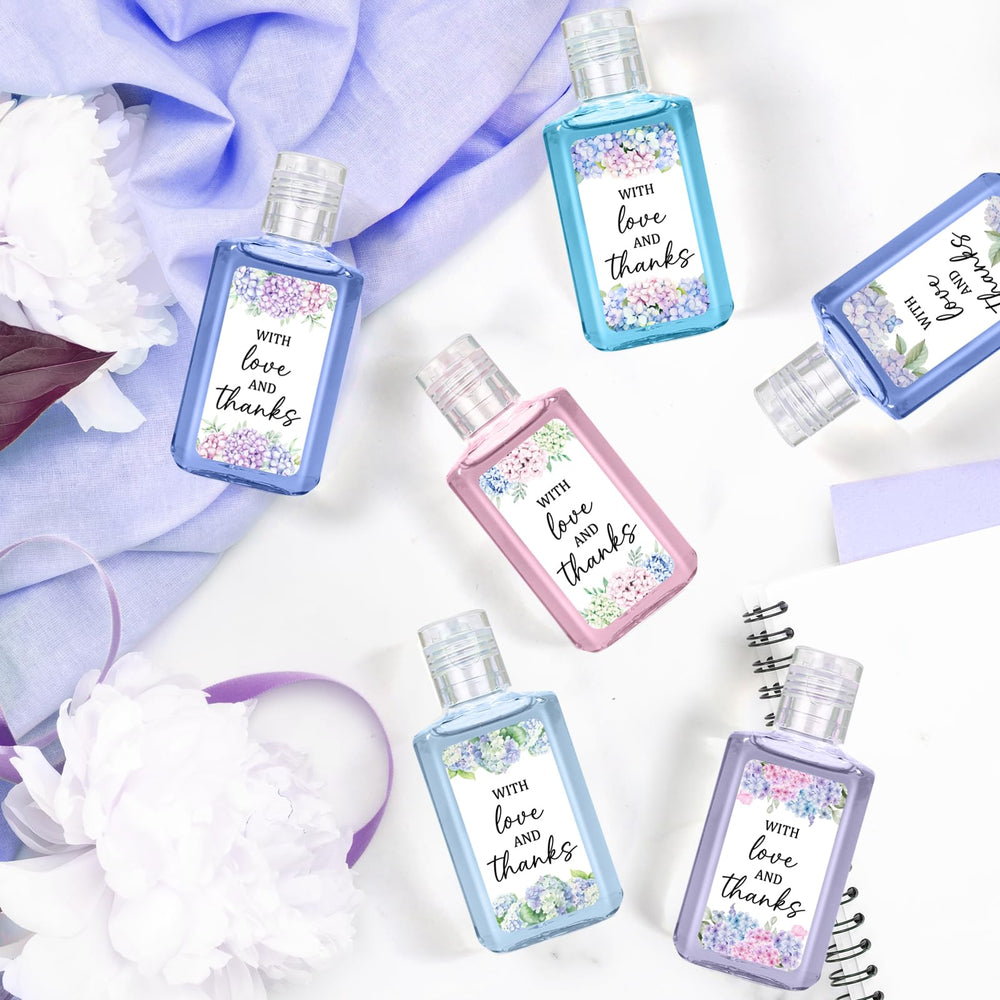 Piuaeue wedding sanitizer gifts arranged on reception tables as stylish favors.