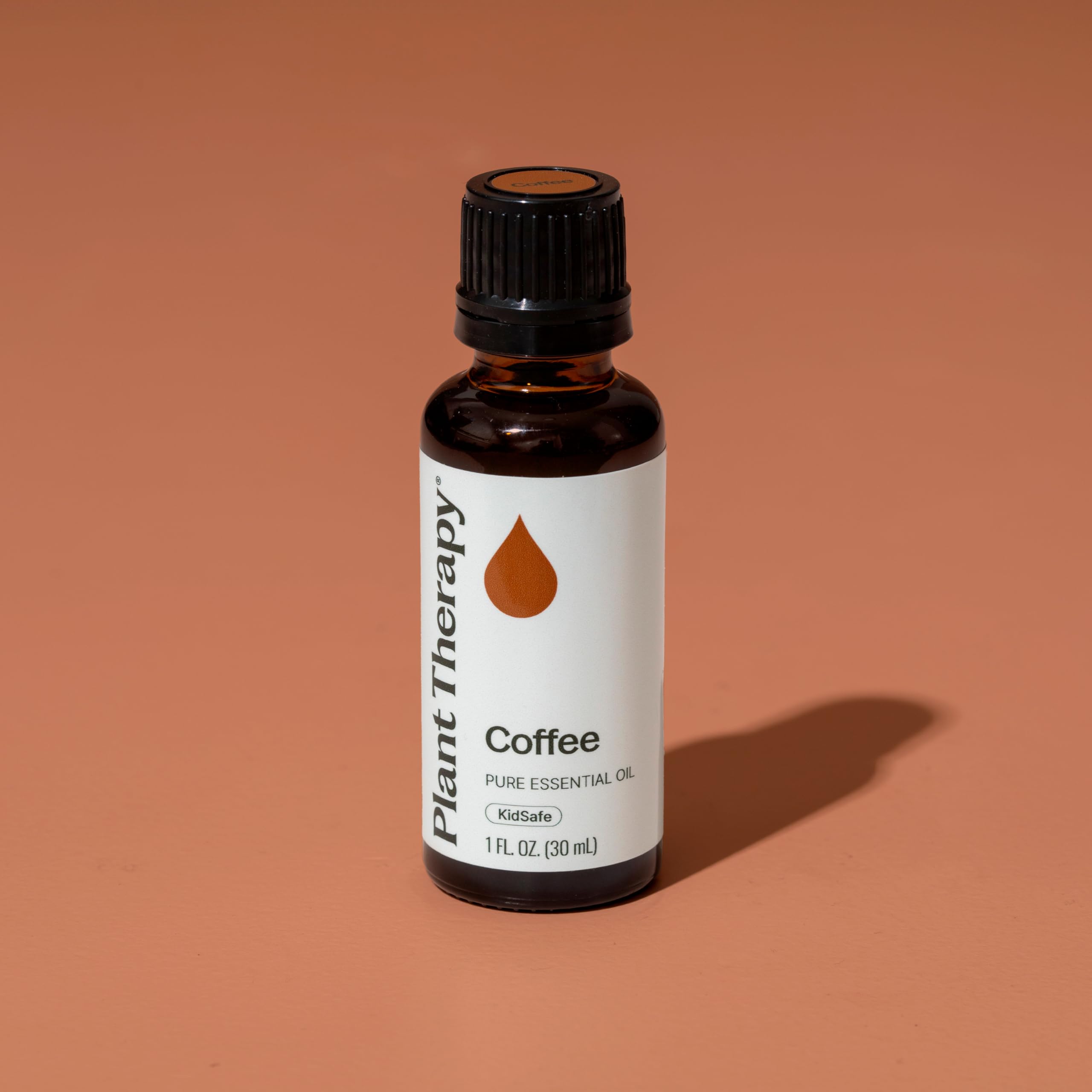 Portable inhaler with Plant Therapy Coffee Oil for quick aroma.