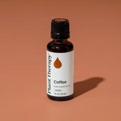 Portable inhaler with Plant Therapy Coffee Oil for quick aroma.
