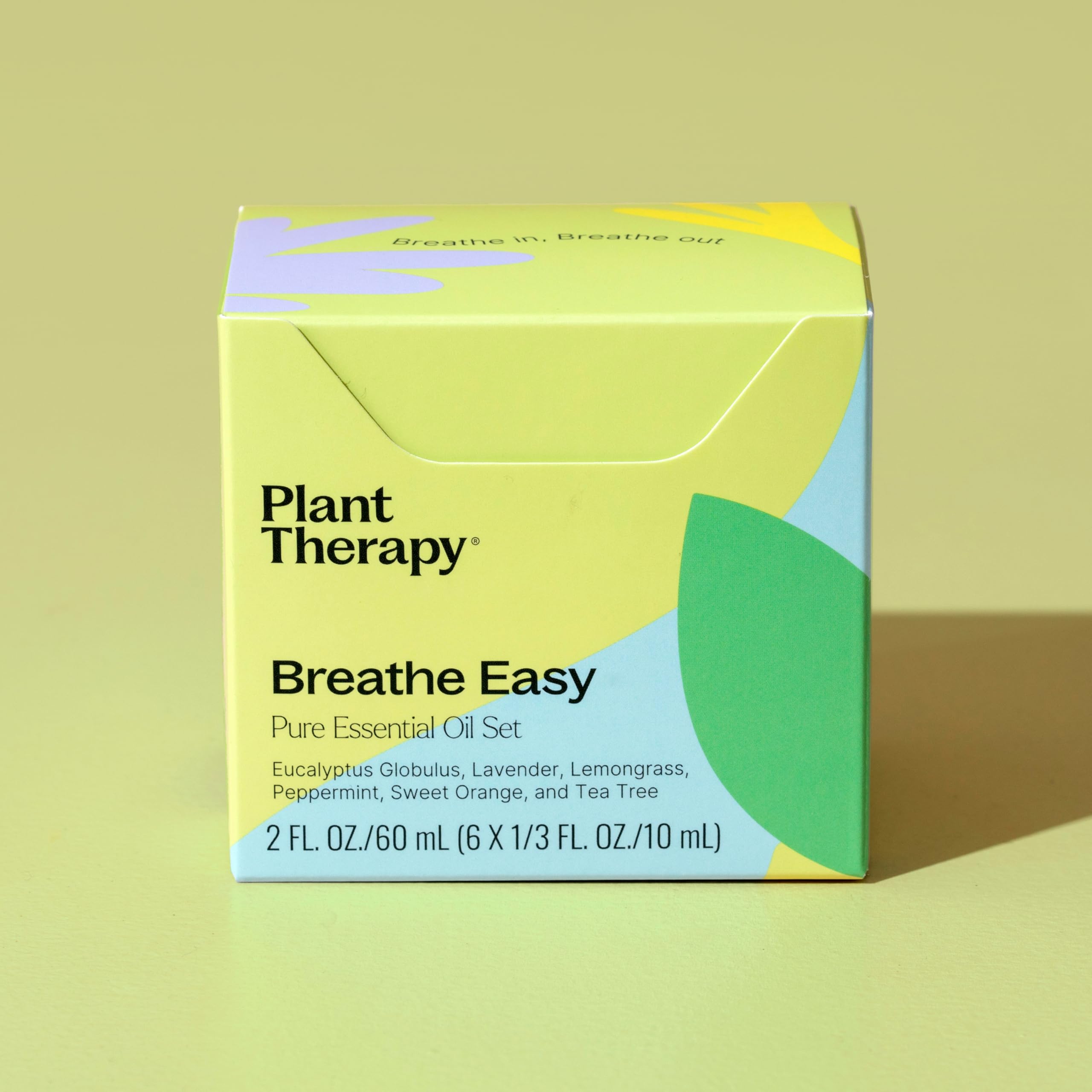 Plant Therapy Peppermint 10ml bottle close-up for cool, invigorating atmosphere.