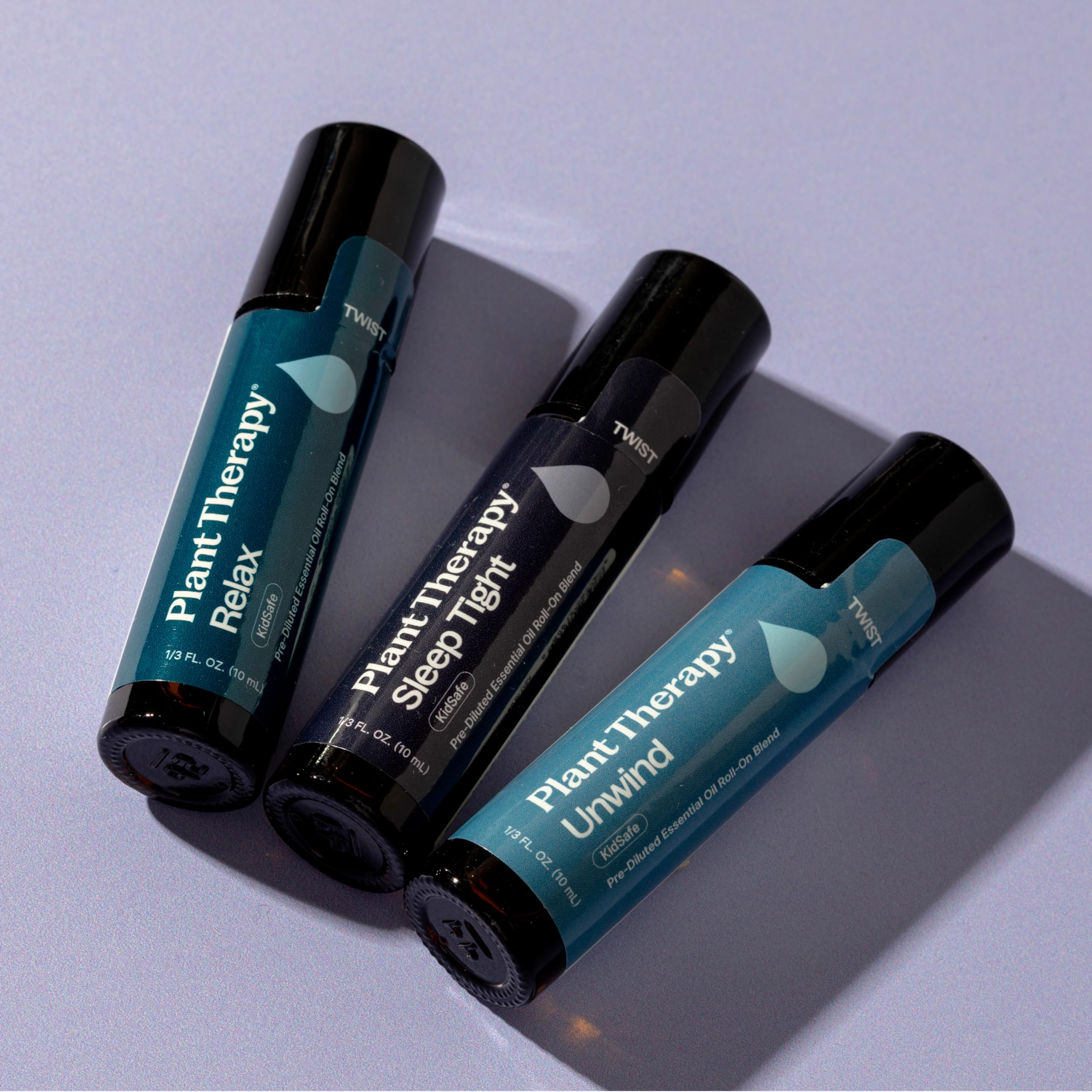 Plant Therapy Sleep Easy trio set displayed on a serene bedside table.