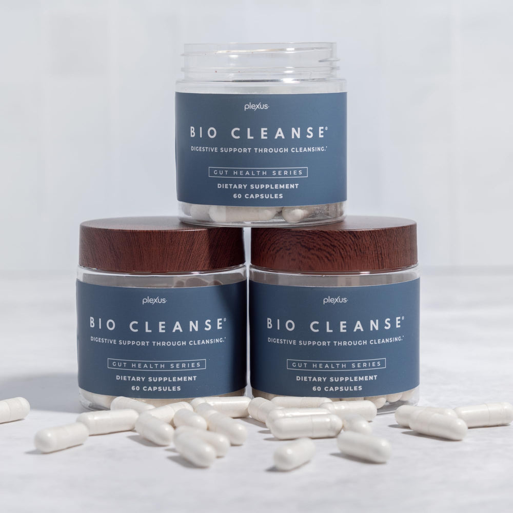 Plexus Bio Cleanse bottle open with capsules ready for regularity-focused use.