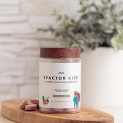 Plexus Xfactor Kids bottle and label highlight daily immune and growth support.