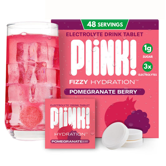 Plink Pomegranate Berry dissolving tablet in water for refreshing, low-sugar hydration.