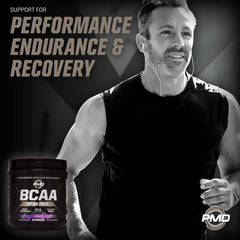PMD BCAA Stim-Free grape being stirred in water for quick hydration.