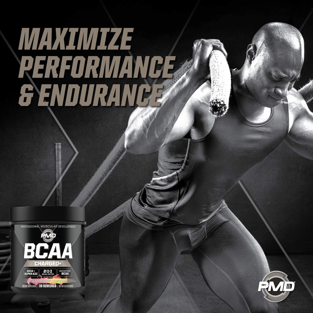 PMD Sports BCAA Charged glass after mixing with strawberry lemonade flavor.