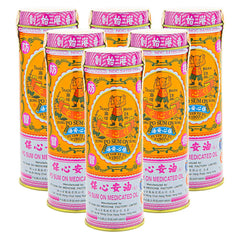 Po Sum On Medicated Oil bottle pour for warming comfort during massage.