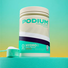Podium Nutrition Hydro Salt glass of water ready for training session.