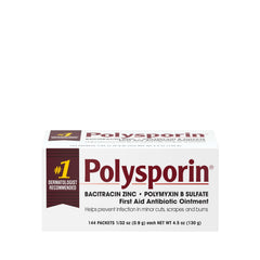 Polysporin first aid ointment tube close-up for infection prevention.