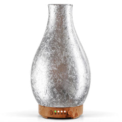 Porseme 100ml diffuser top view showcases elegant silver-plated volcano design and glass body, premium ambience