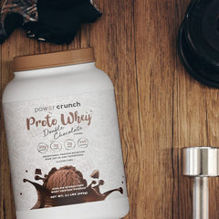 Power Crunch Proto Whey shaker on the go for convenient protein boosts.