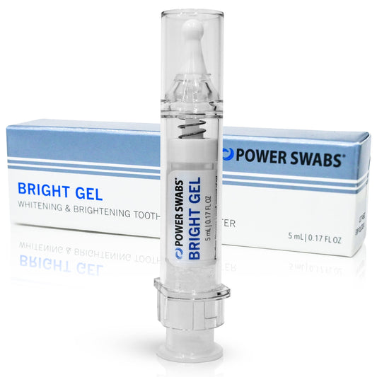Power Swabs Bright Gel on toothbrush providing daily whitening boost.