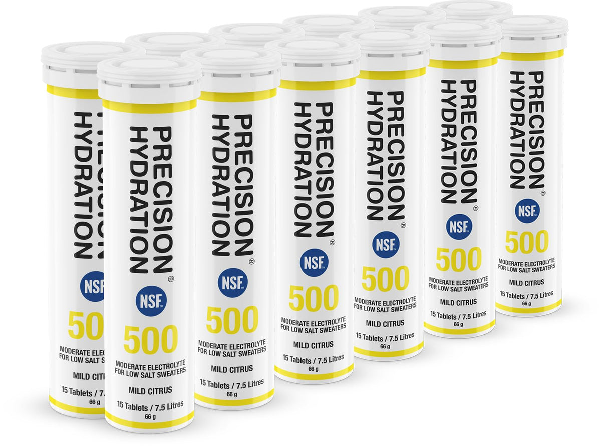 Precision Hydration electrolyte tablets poured into bottle for quick hydration during workouts