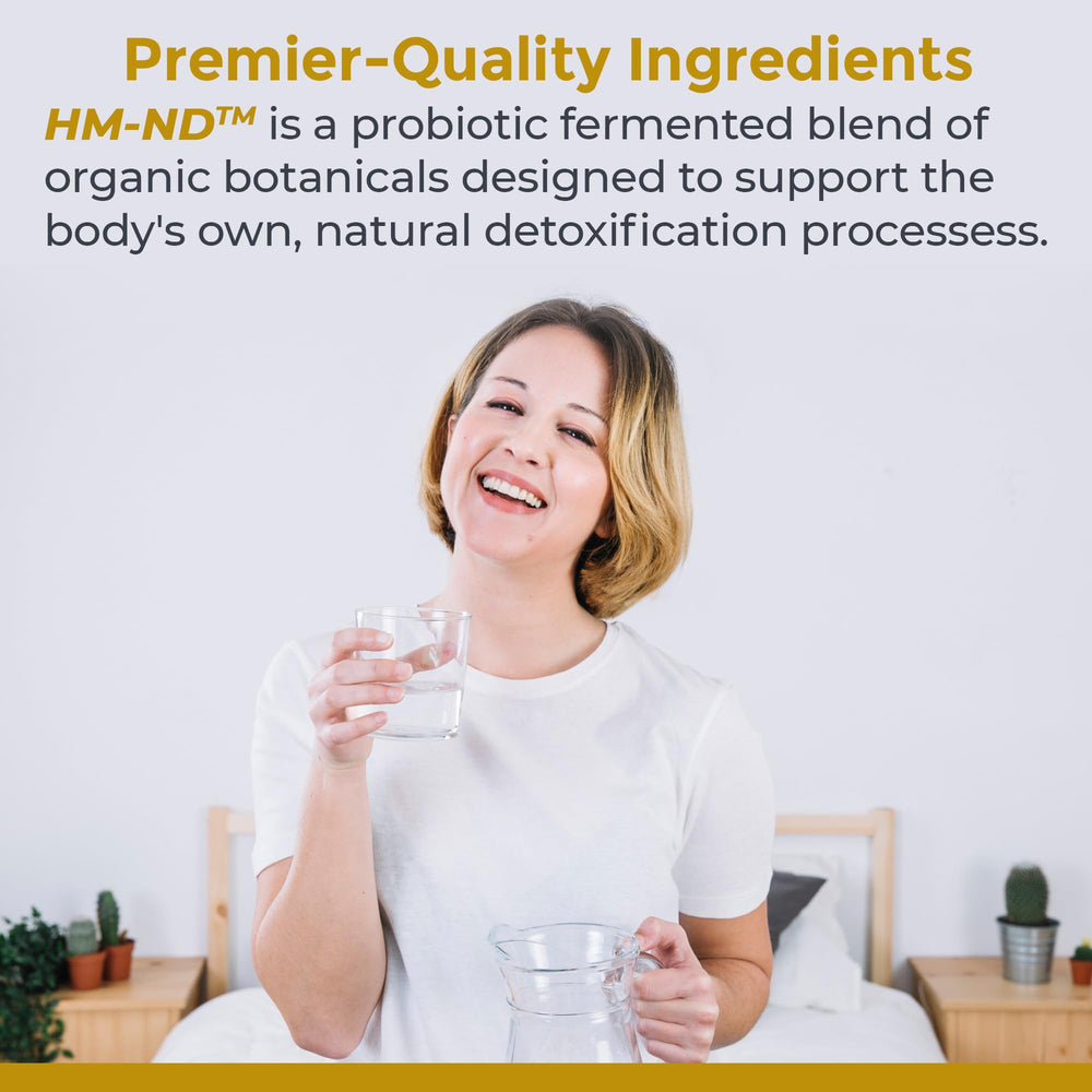 Premier Research Labs Fermented HM-ND glass of water with drops for easy mixing