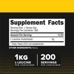 Primaforce L-Leucine powder scoop resting beside jar, indicating convenient serving size.