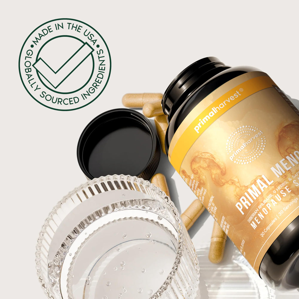 Primal Harvest Meno+ capsules on a desk implying daily wellness routine.