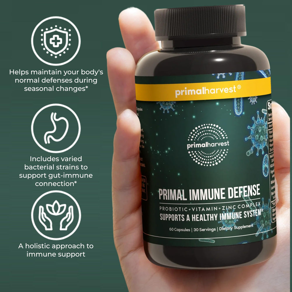 Primal Harvest Primal Immune Defense bottle with glass of water ready to take