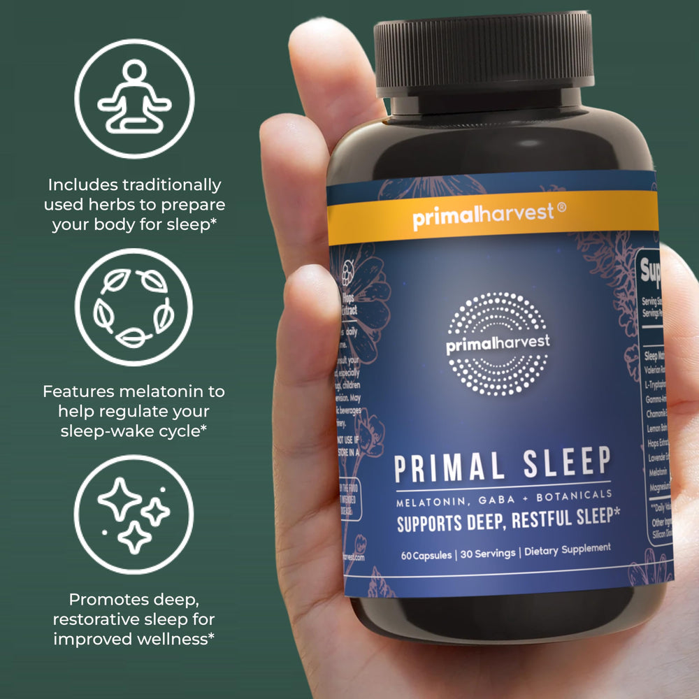 Serene bedside setup with Primal Sleep on the nightstand.