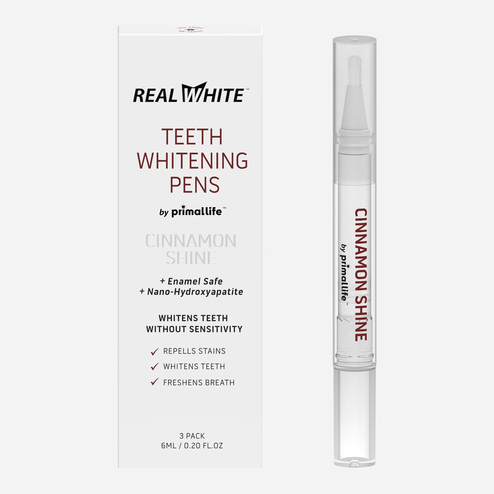 Primal Life Organics Real White Teeth Pen cap close-up for portable whitening.